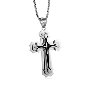 Pendentif croix en acier inoxydable avec motifs noirs vintage sur fond blanc brillant