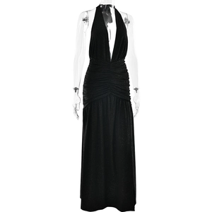 Close-up of the deep V-neck and ruched waist detail on a sparkly black evening dress