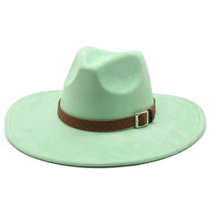 Detail view of mint green suede fedora with brown braided leather band and silver buckle