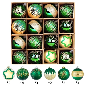 Detailed set of 16 green and gold Christmas ornaments with peacock and star patterns