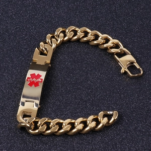 Close-up of golden stainless steel Cuban link medical alert bracelet with red Caduceus star