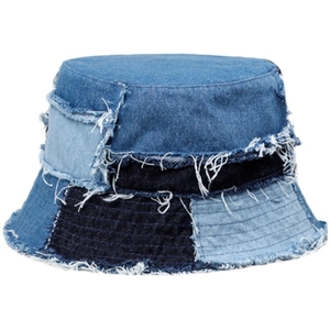 Frayed patchwork denim bucket hat featuring multi-tone blue colors and street style design