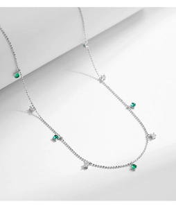 Detail of s925 silver beaded chain with emerald green and white square zircon charms