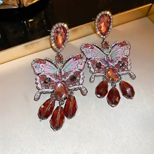 Vintage butterfly crystal tassel earrings with pink enamel and teardrop gemstones