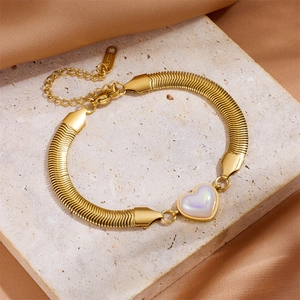 Gold stainless steel snake chain bracelet featuring a shimmering white heart pearl pendant
