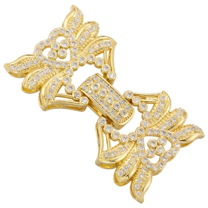 Macro shot of gold-plated butterfly necklace clasp set with cubic zirconia stones