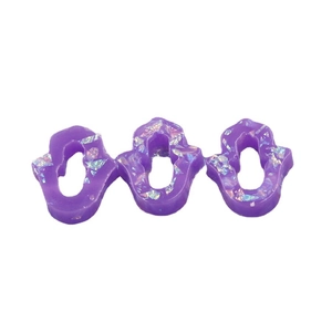 Three purple translucent Hamsa resin charms with iridescent glitter on white background