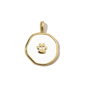Detailed view of a gold-trimmed white enamel pendant featuring a cat paw print design
