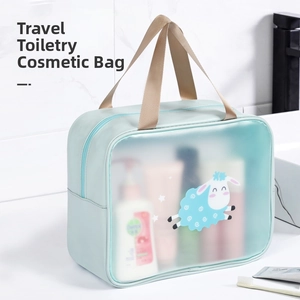 Detail of waterproof travel toiletry bag with cartoon sheep and sturdy brown handle