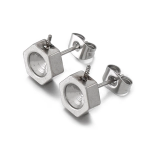 Minimalist silver stainless steel hexagonal nut stud earrings on a white background