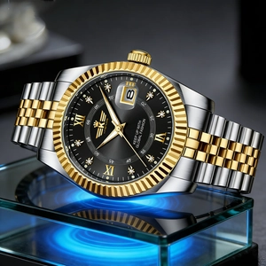 Detail of elegant two-tone steel watch with black dial and Roman numeral calendar