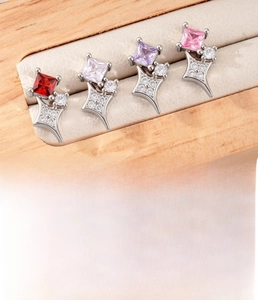 Macro view of square zircon star earrings with titanium steel screw back studs