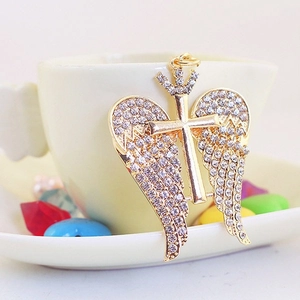 Golden alloy angel wing keychain with sparkling rhinestones and cross pendant charm