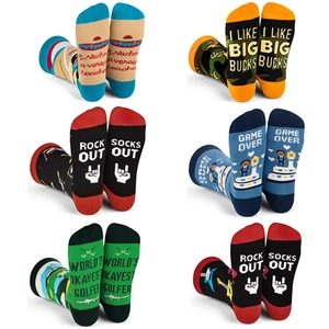 Detail of creative mismatched socks with fun printed text patterns on the soles
