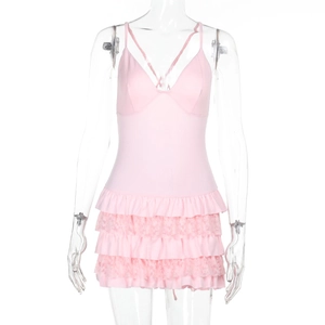 Detailed view of pink lace ruffle mini dress layers on a transparent mannequin