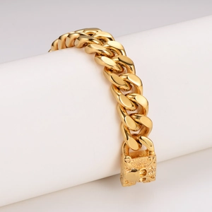 Gold Cuban link bracelet for men with skull embossed clasp and heavy metal street style