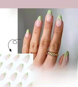 Detail of almond-shaped French press-on nails with green tips and white wave patterns