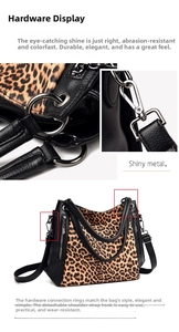 Close-up of shiny silver metal hardware and detachable strap hooks on leopard print bag