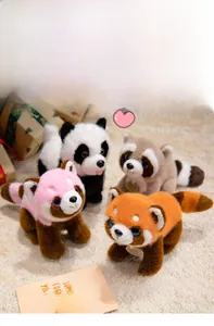 Group of plush panda and tiger toys with gold tags on soft carpet for kids