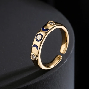 Elegant 18K gold plated copper open ring with blue enamel moon and sparkling zircon
