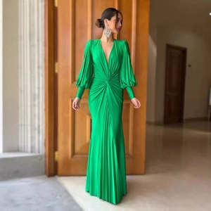 Elegant dark green V-neck pleated maxi dress with lantern sleeves and a cinched waistline