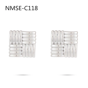 Detailed close-up of silver square stud earrings with woven texture and metallic finish