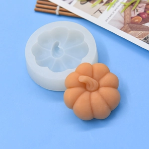 Halloween pumpkin silicone mold for DIY baking with detailed orange pumpkin cake finish