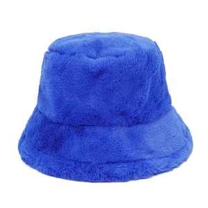 Macro detail of royal blue plush faux fur texture on a warm winter bucket hat