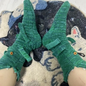 Funny green knitted crocodile socks with button eyes and unique 3D animal design