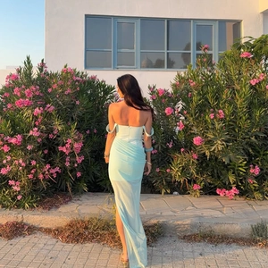 Elegant light blue backless maxi dress with high slit and flattering ruched details