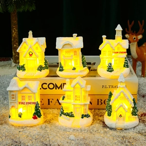 Set of 6 glowing resin miniature Christmas houses with warm LED light on snow