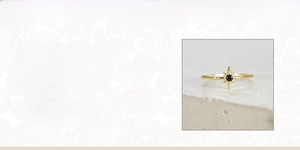 Detailed specs of octagon star ring in 18k gold plated silver with black cubic zirconia