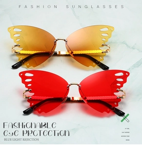 Detail of yellow and red butterfly sunglasses with metal temples and resin lenses