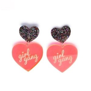 Exaggerated glitter acrylic heart earrings with Girl Gang script for women