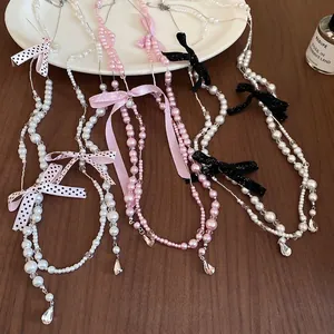 French style bow and pearl necklace with sparkling rhinestone and teardrop charms