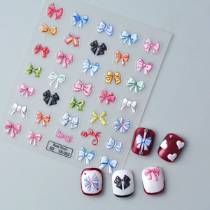 Detailed 5D embossed bow knot nail stickers in macaron colors for 3D manicures