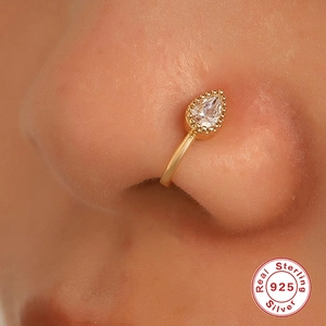 Golden S925 sterling silver nose cuff featuring a sparkling pear-shaped zircon stone