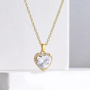 Elegant 18K gold plated copper heart pendant necklace with shimmering zircon stones
