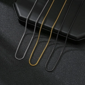 Close-up of 2mm stainless steel box chain necklaces in silver, gold, and black colors