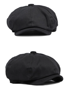 Front and side view of a black cotton newsboy cap with vintage texture and top button
