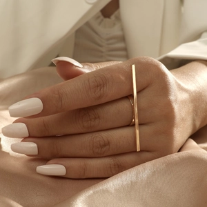 Minimalist gold bar open ring with polished vertical rectangle bar on model finger