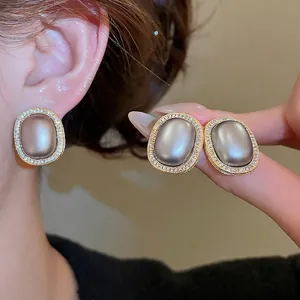 French vintage oval pearl earrings with gold plating and white zircon accents for women