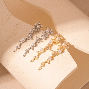 Elegant gold and silver wheat ear drop earrings with marquise zircon and white pearls
