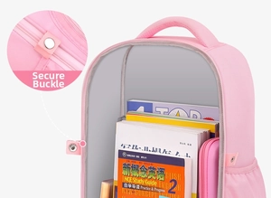 Detail of pink school bag side buckle and spacious interior compartment for A4 books
