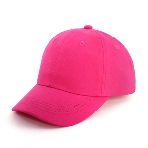 Detail of rose pink kids baseball cap showing cotton twill texture and stitching