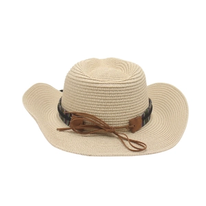 Close-up of woven straw cowboy hat with colorful ethnic band and leather detail