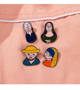 Detailed macro of four enamel pins featuring cartoon parodies of famous world paintings