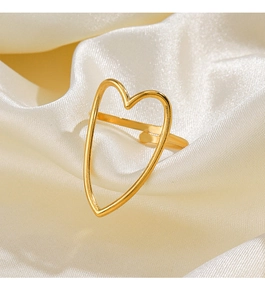 Detailed view of an adjustable golden heart-shaped ring resting on elegant cream satin