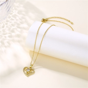 Gold stainless steel heart pendant necklace with LOVE lettering and star details