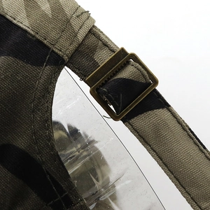 Close-up of the camo baseball cap adjustable strap with bronze metal buckle detail